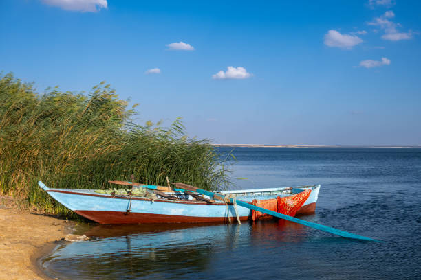 Fishing boat on morris lake in Fayoum Oasis , Egypt
